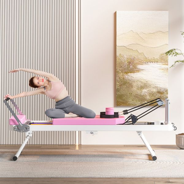 Pink foldable Pilates core bed